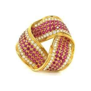 Broches en or jaune serties de rubis & diamants