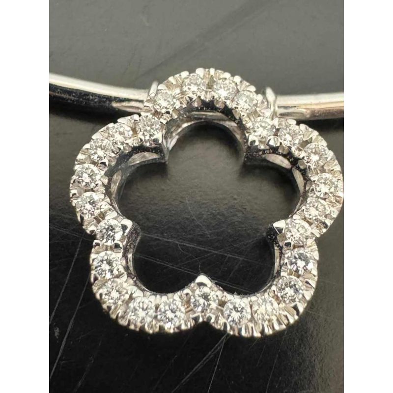 Gold necklace with diamond-set leaves