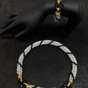 Set in 18-carat yellow gold (necklace & bracelet), rock crystal & black onyx