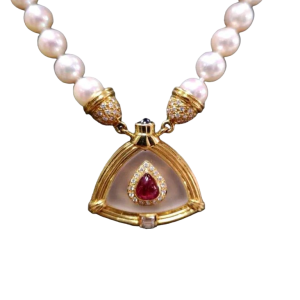 Collier met parel, goud, robijn en bergkristal