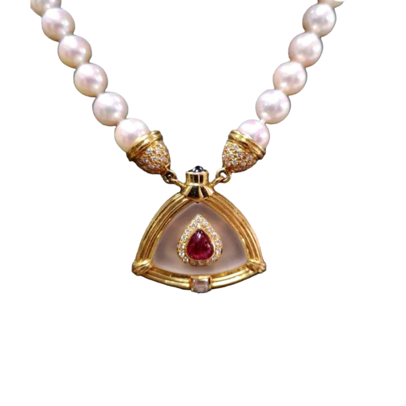 Collier met parel, goud, robijn en bergkristal