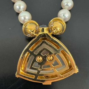 Collier met parel, goud, robijn en bergkristal