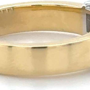 Bague en or bicolore sertie de cinq diamants en taille "émeraude"