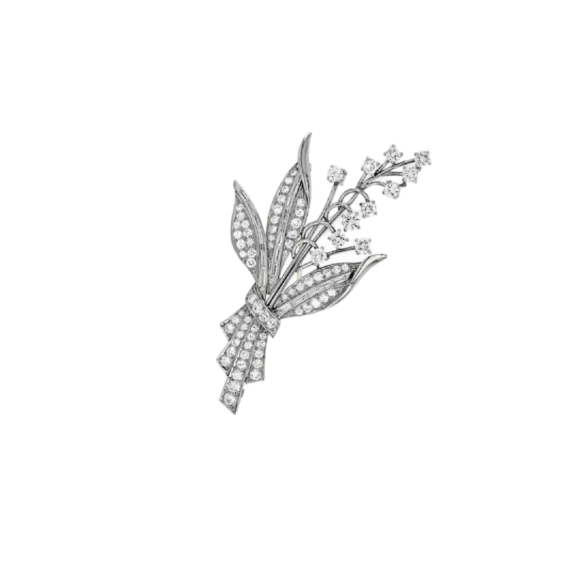 Broche vintage en platine avec diamants taille brillant et taille baguette