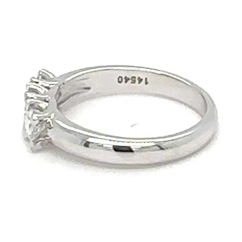 Trilogy ring, white gold and diamonds