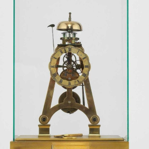 Brass skeleton clock by Dent London