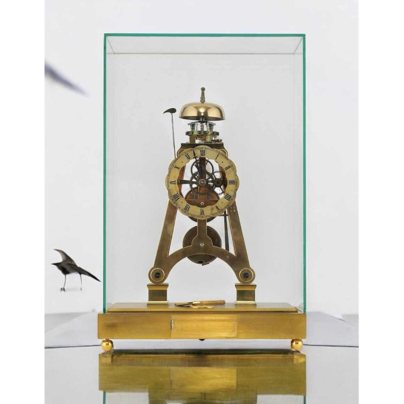 Brass skeleton clock by Dent London