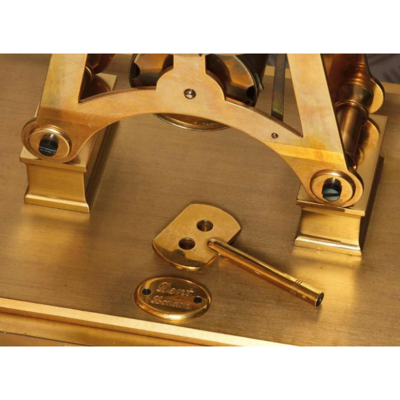 Brass skeleton clock by Dent London