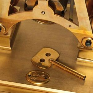 Brass skeleton clock by Dent London