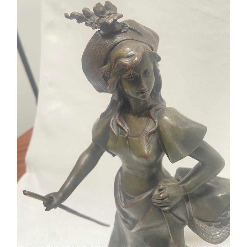 De mascotte van Auguste Dewever ondeugend bronze