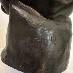 Antique bronze sculpture in the style of Rodin's The Thinker