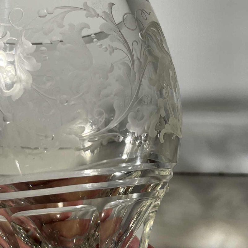 Pair of stemmed glasses in thick cut crystal with scrollwork and monogram decoration, Bohemia ca 1900