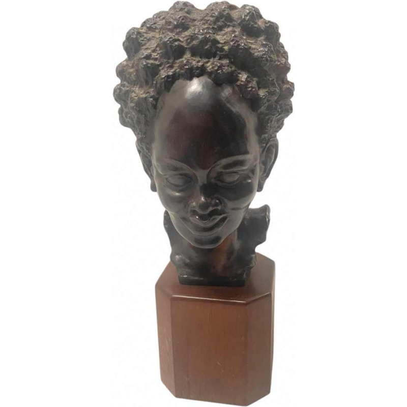 Tête de jeune femme africaine bois de macassar signée R.v.d Bael