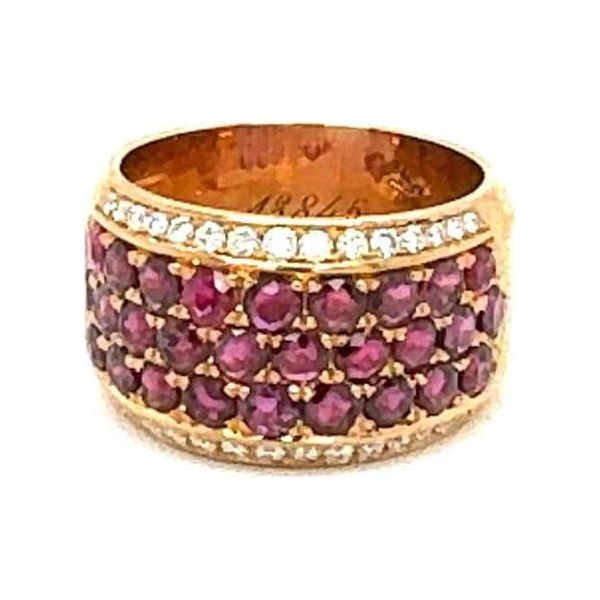 Bague en or rose 18ct sertie de diamants et rubis resplendissants