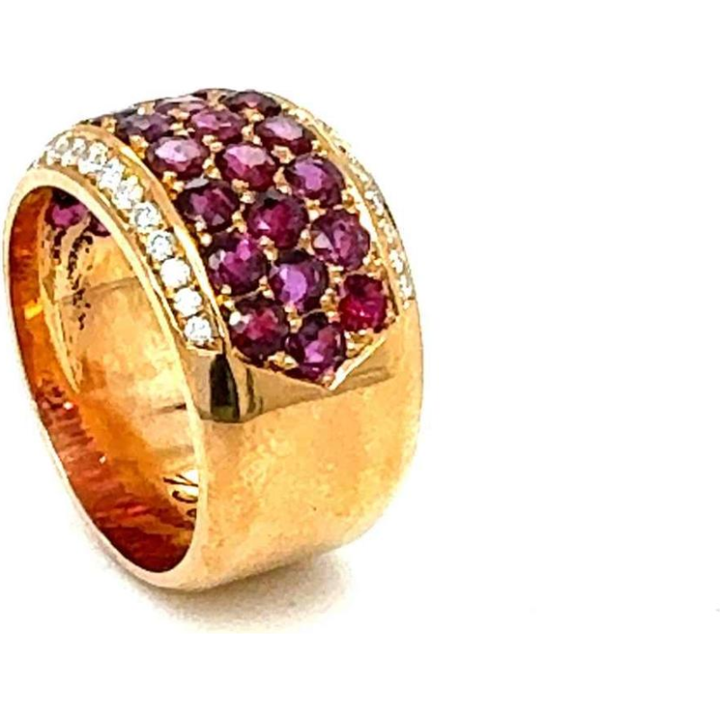Bague en or rose 18ct sertie de diamants et rubis resplendissants
