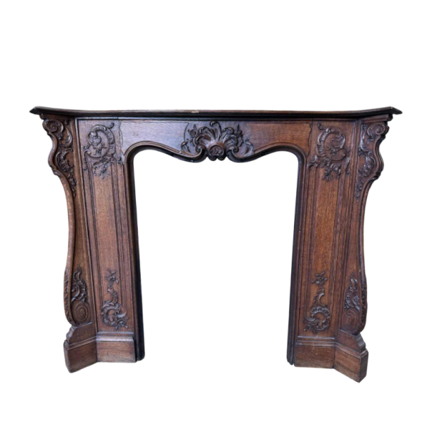 Louis XV mantel from Liège in richly carved oak, 19th century