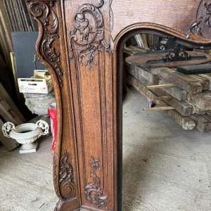Louis XV mantel from Liège in richly carved oak, 19th century