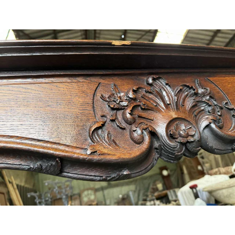 Louis XV mantel from Liège in richly carved oak, 19th century