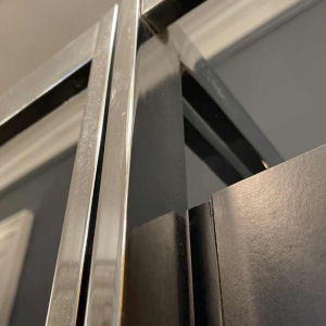 Pair of Modernist Chrome and Black Formica Wall Unit Shelves, ca 1970