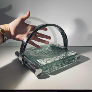 Jacques Adnet, Art Deco empty pocket in chromed steel and thick textured glass, 20th century