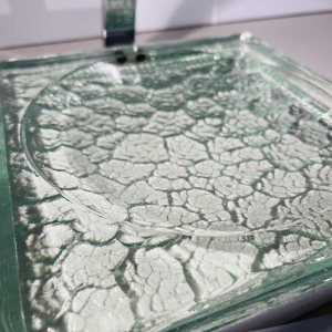 Jacques Adnet, Art Deco lege zak in verchroomd staal en dik getextureerd glas, 20e eeuw