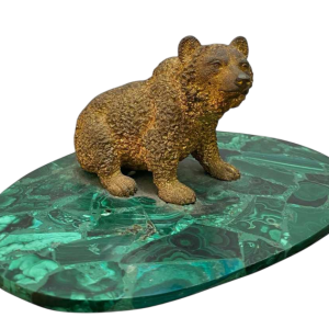 Bronze sculpture of a bear on an oval malachite base