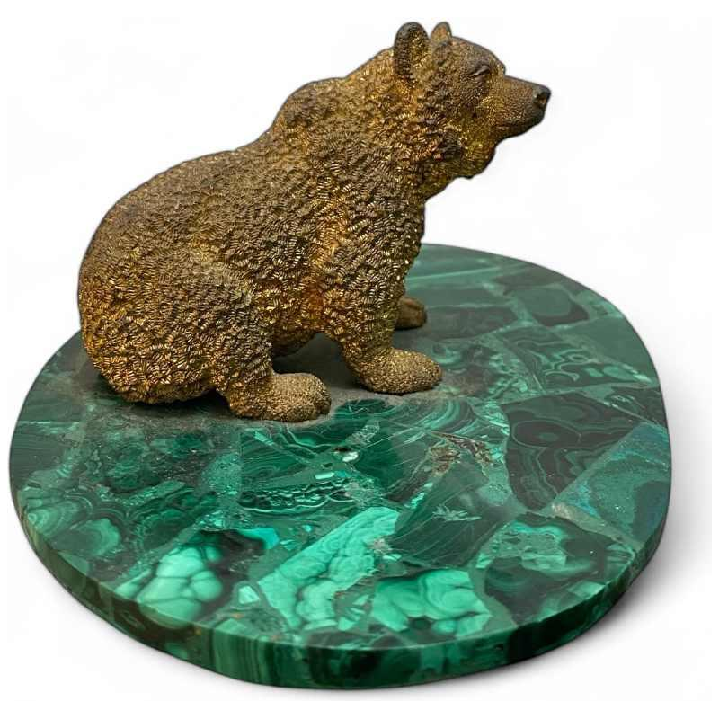 Bronze sculpture of a bear on an oval malachite base