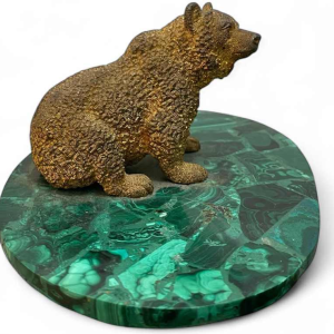 Bronze sculpture of a bear on an oval malachite base