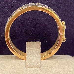 Bague à système d'ouverture or & diamants, ca 1990