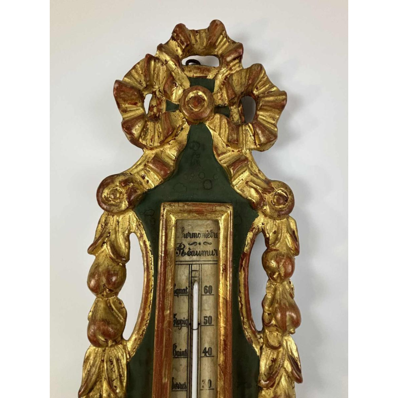 Baromètre-thermomètre Louis XVI à échelle Réaumur en bois doré, par Benard à Provins, XIXe s