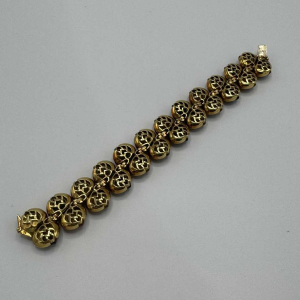 Bracelet René Boivin en or jaune 18 carats serti de 3 essences de bois