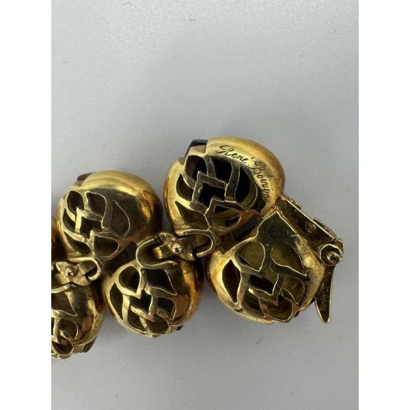 Bracelet René Boivin en or jaune 18 carats serti de 3 essences de bois