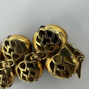 René Boivin armband in 18 karaat geel goud bezet met 3 soorten hout