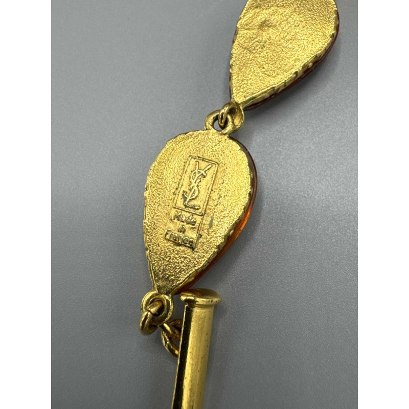 Yves Saint Laurent, collier en métal doré et pate de verre orangé et bordeaux, fin XXe s