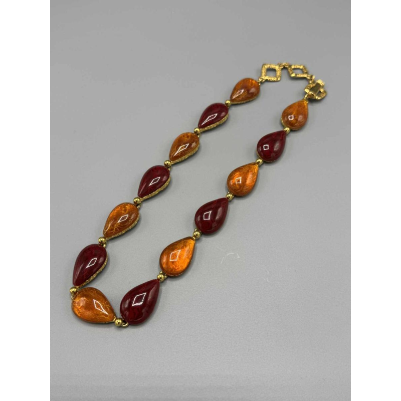 Yves Saint Laurent, necklace in gilt metal and orange and burgundy glass paste, late 20th c