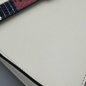 Gucci. Sac Lilith en cuir blanc et python