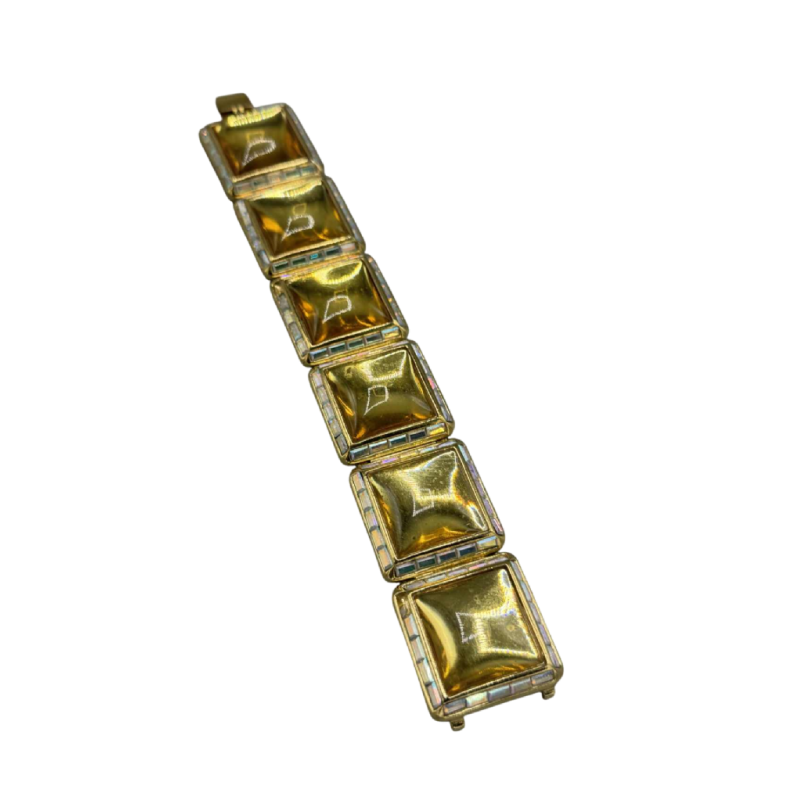 Yves Saint Laurent. Bracelet en métal doré, pâte de verre jaune, strass taille baguette