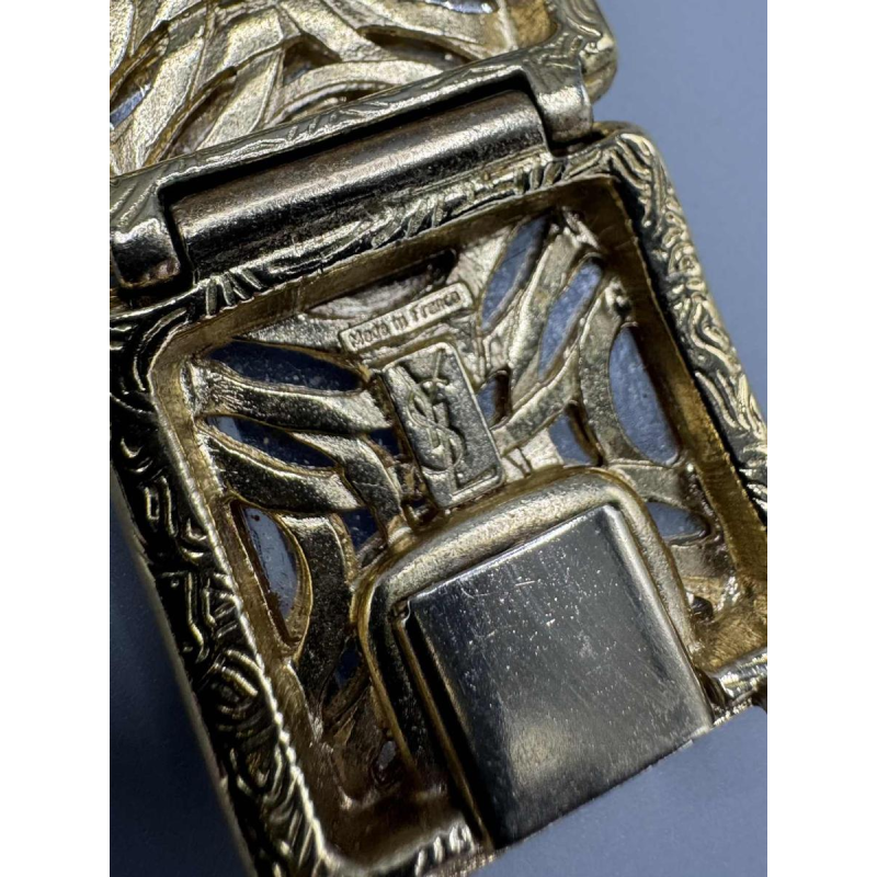 Yves Saint Laurent. Gold-plated metal bracelet, yellow glass paste, baguette-cut rhinestones