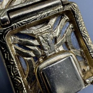 Yves Saint Laurent. Bracelet en métal doré, pâte de verre jaune, strass taille baguette