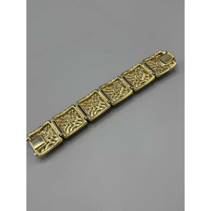 Yves Saint Laurent. Vergulde metalen armband, gele glaspasta, baguette-geslepen strass-steentjes