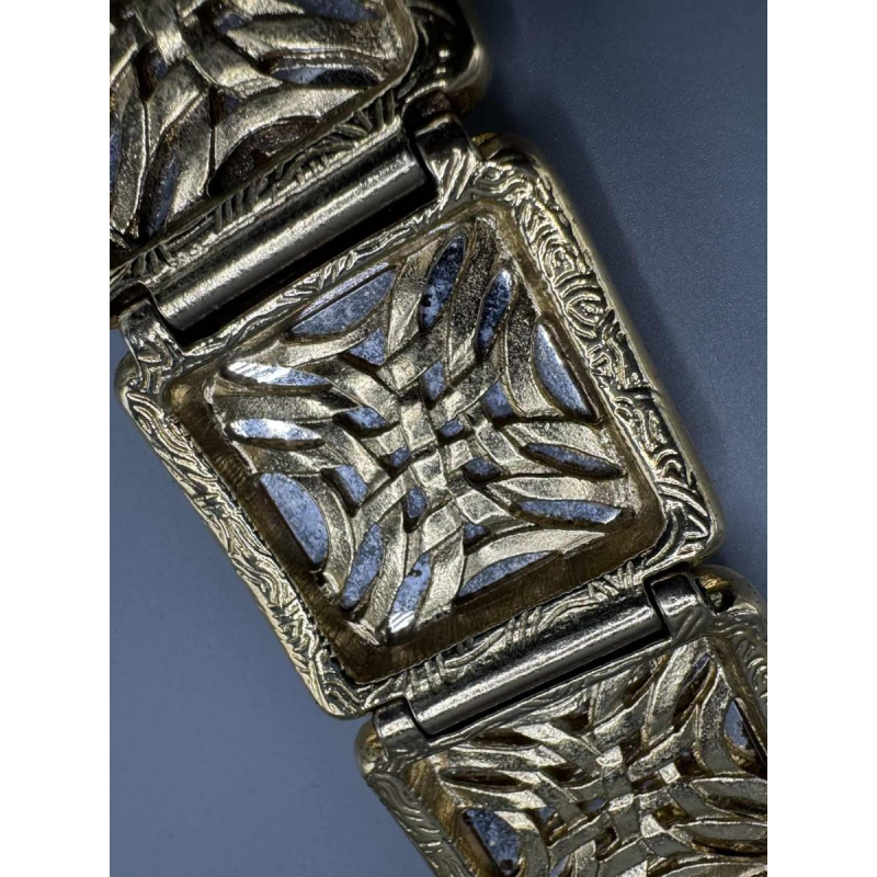 Yves Saint Laurent. Gold-plated metal bracelet, yellow glass paste, baguette-cut rhinestones