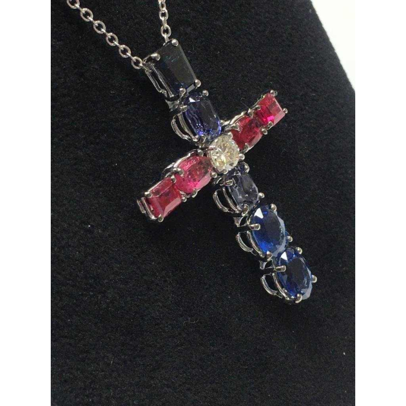 "Kruis” hanger bezet met blauwe saffieren, robijnen en diamanten