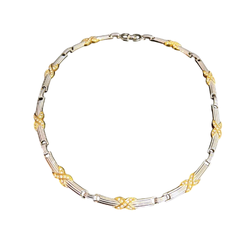 Christian DIOR, collier ras de cou, métal argenté et doré