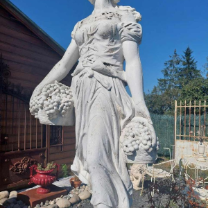 Garden sculpture Lady with grapes in reconstituted stone