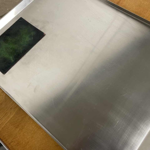 Table basse, bois massif, acier chromé. plateau amovible inox et plaque émaillée, ca 1970