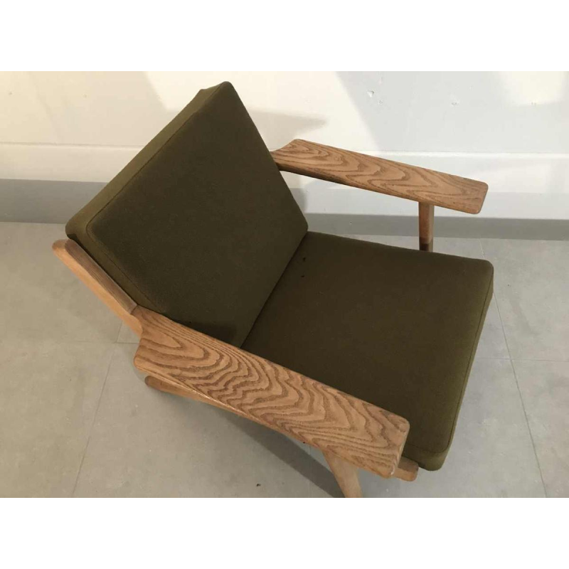 HANS WEGNER - GE 290 armchair produced by GETAMA, solid oak and khaki green fabric, ca 1960