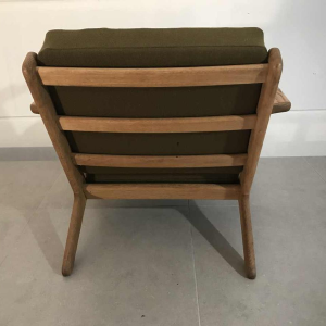 HANS WEGNER - GE 290 armchair produced by GETAMA, solid oak and khaki green fabric, ca 1960