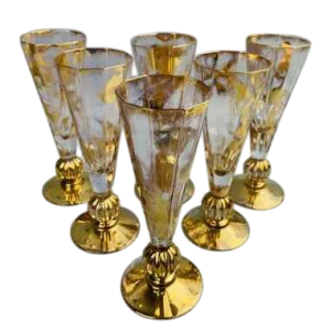 Jean-Paul van Lith in Biot, suite of six gilded crystal champagne flutes, 20th c