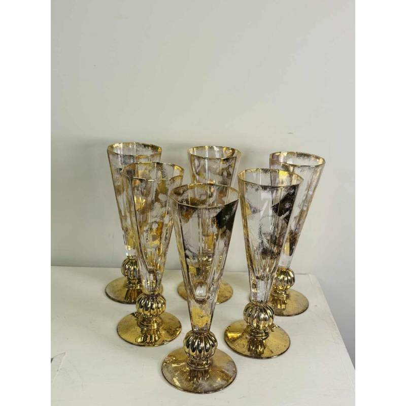 Jean-Paul van Lith in Biot, suite of six gilded crystal champagne flutes, 20th c