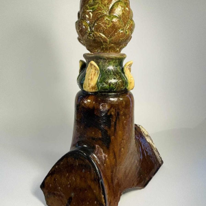 Bavent aardewerk, geglazuurde terracotta artisjokvormige daknok, eind 19e eeuw
